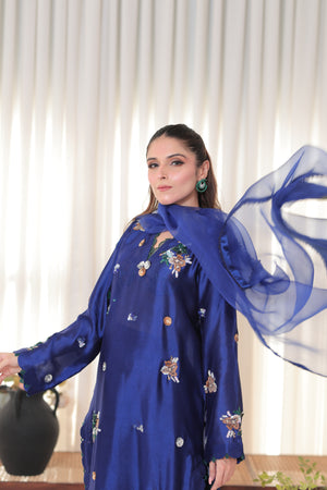 Cobalt blue 3-piece Sheesha silk ensemble with hand-embroidered shirt, organza dupatta, and gota-detailed pants for festive occasions