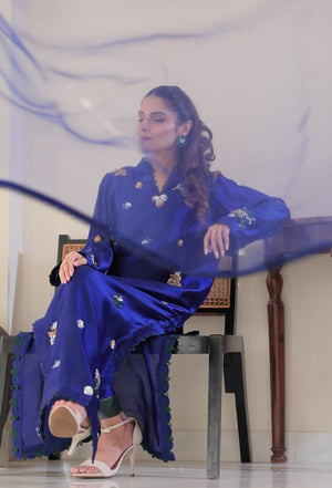 Elegant cobalt blue Sheesha silk dress with floral hand embroidery, paired with matching organza dupatta and scalloped detailing