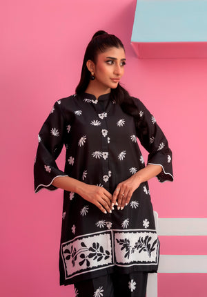 Monochrome Muse two-piece summer outfit in black with white floral digital print