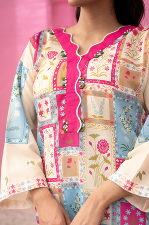 Breathable summer fabric two-piece set with magenta, blue, and cream prints