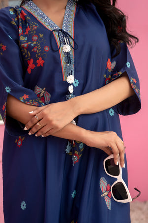 Breathable summer fabric kaftan in deep blue with vibrant floral patterns