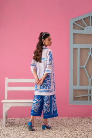 Breathable summer fabric in striking blue and white with intricate detailing