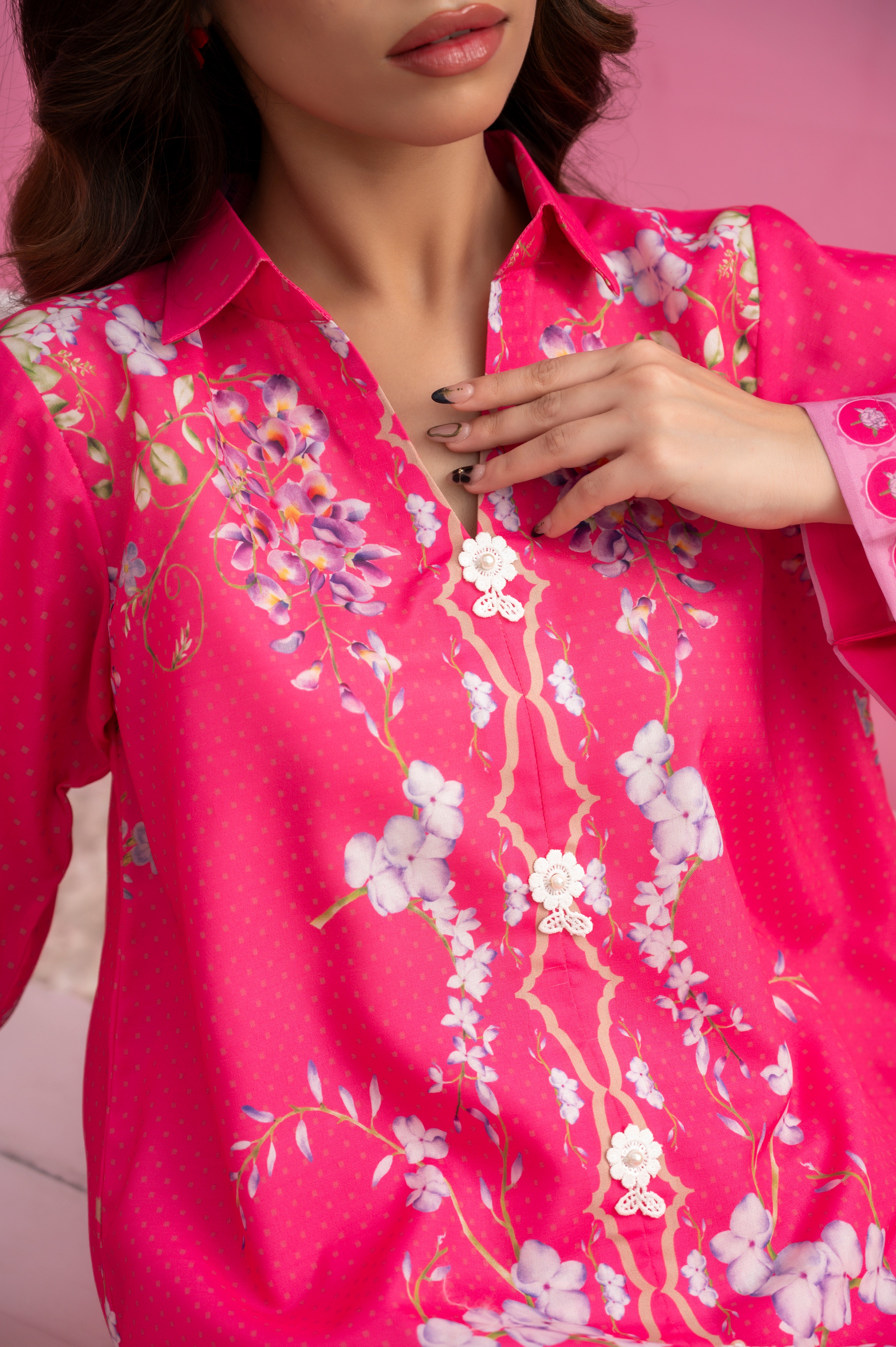 Breathable pink summer fabric with intricate white floral patterns and detailing