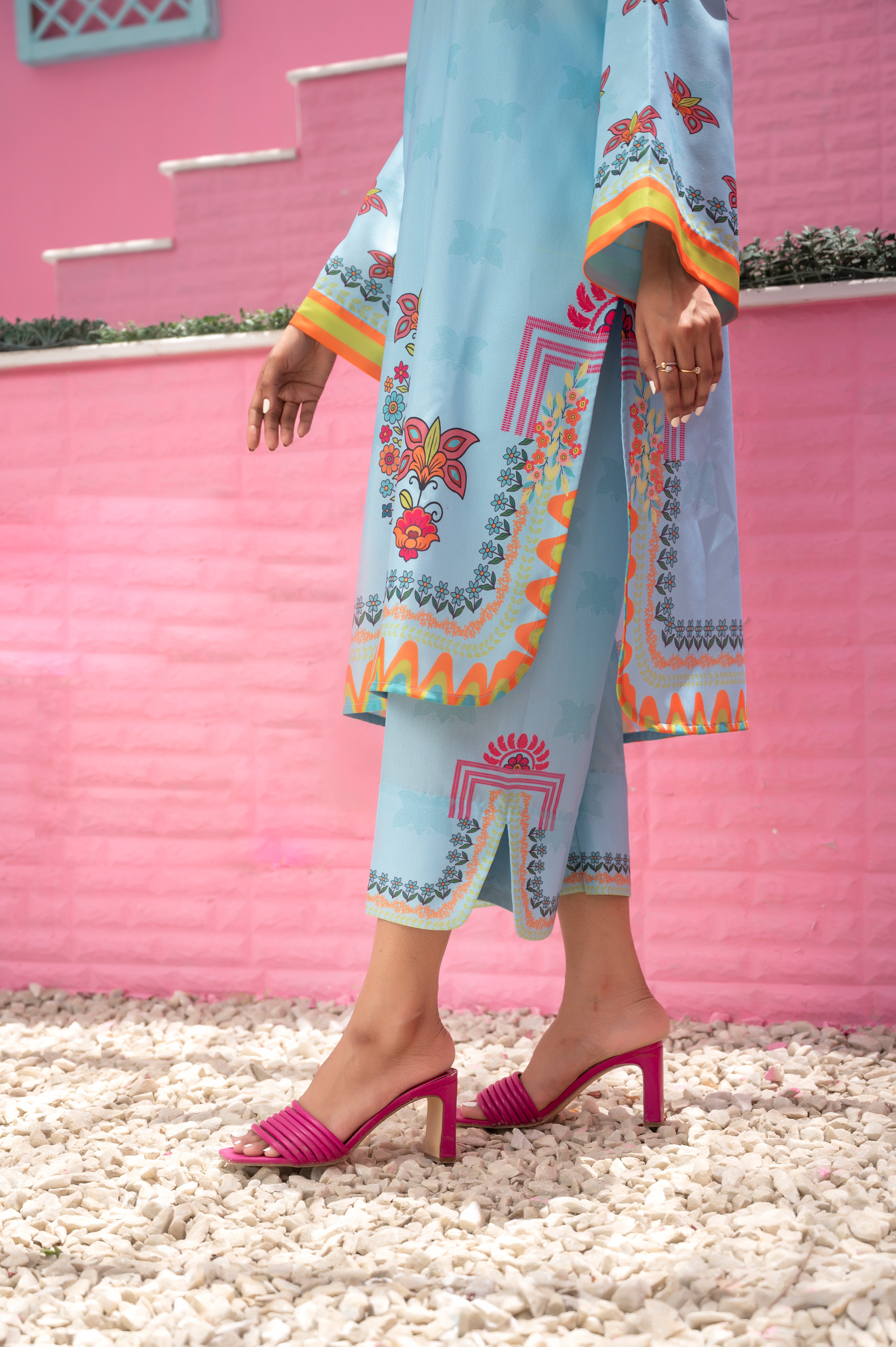 Light blue breathable fabric dress with vibrant butterfly and floral prints