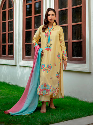 3-piece khaddi silk outfit in mango tone with hand embroidery and pure silk dupatta featuring lace and dual-tone shading
