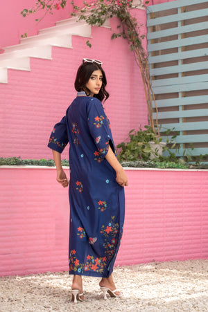 Elegant navy blue printed dress with intricate detailing and lightweight fabric