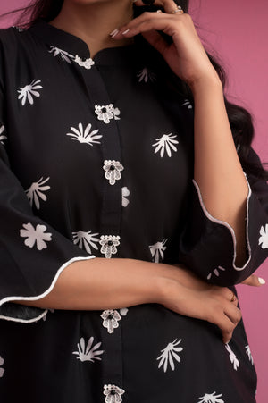 Elegant black kurta and trousers set with striking white digital print patterns