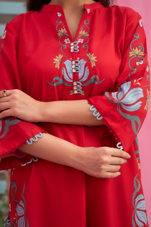 Bright red summer wear with floral patterns and lightweight comfortable fabric