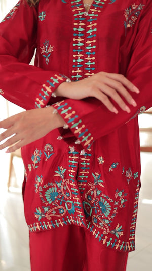 Chillie – vibrant red designer Pakistani outfit with hand and machine embroidery, lace detailing, and optional dupatta